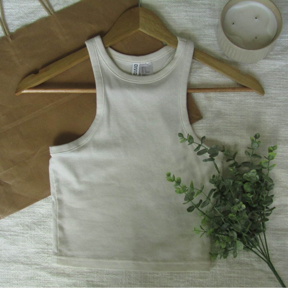 Cream Divided tank in the size small.
